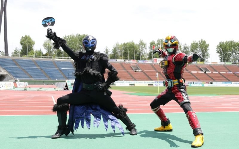 KANAZAWA, JAPAN - JUNE 06: YASAGARASU and GENZOYER  of Zweigen Kanazawa Mascots are seen during the J.League Meiji Yasuda J2 match between Zweigen Kanazawa and Omiya Ardija at the Ishikawa Athletic Stadium on June 06, 2021 in Kanazawa, Ishikawa, Japan. (Photo by J.LEAGUE/J.LEAGUE via Getty Images)